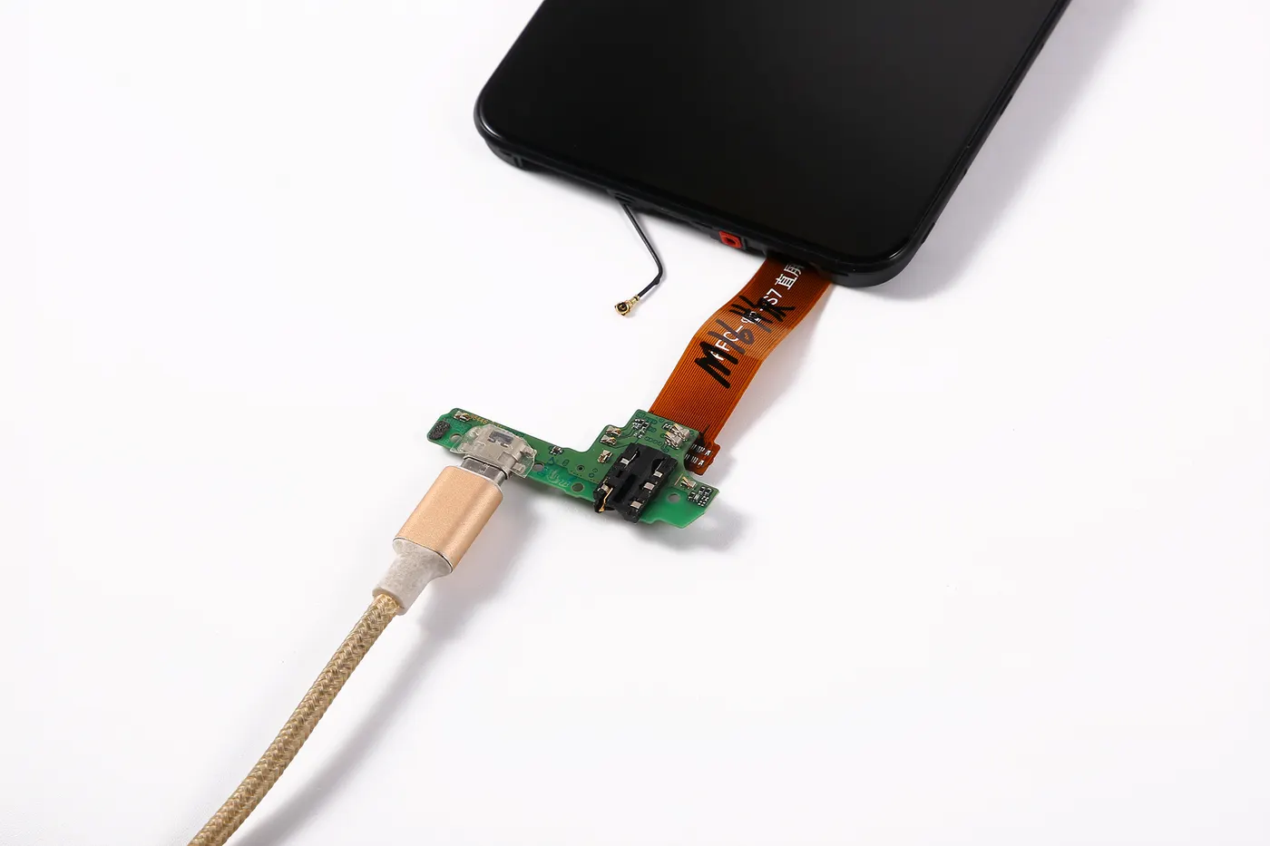 VELHUA technician testing an LCD screen before shipment